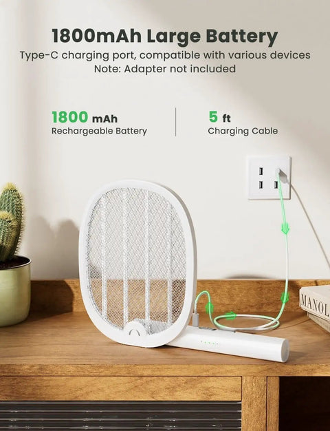 Portable 2 In 1 Electric Fly Swatter Bug Zapper Racket With Purple Light Attractant Rechargeable 1800mAh on a shelf charging