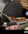 Precision Tongs And Spatula Grilling Tool Set With Hands Free Locking Tongs and 3 Sided Beveled Spatula next to grill with cooked meat