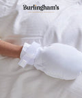 Double Security Mitts For Hand Restraint In Healthcare on hand, white mitt with strap, extra padding for comfort, no slip fit