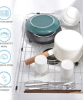Stainless Steel Kitchen Sink Grid And Protector For Center Drain Bottom Rack 24 1/8 By 12 5/8 Inches holding dishes and utensils