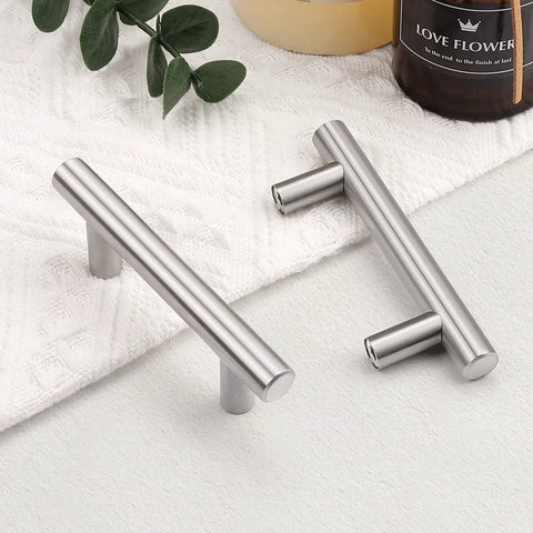 Close-up of two brushed nickel T bar cabinet pulls, stainless steel, 5 pack, 4 inch total length, kitchen handles, and M4 screws