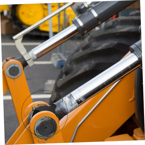 Two Piece Excavator Pin Shim Kit With Durable Round Rubber Washers For Easy Replacement Compatible With Boom Pads Reducing Noise And Vibration In Industrial Machinery on excavator arm