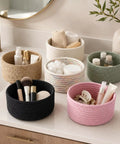 Super Handy Small Woven Cotton Rope Basket For Versatile Home Organization Black Storage Bin holding makeup brushes and cosmetics.