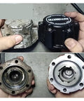 Comparison of Heavy Duty Automatic Wheel Locking Hub For Pickup Trucks Anti Theft Front Axle Lock 28 Spline, one new, one used.