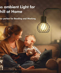 Industrial LED Floor Lamp Tall Standing Light With 6W Bulb Foot Switch No Fuss Easy Setup Metal Modern Floor Lamp illuminating a cozy family scene