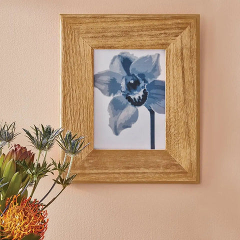 Premium Golden Oak Oil Based Wood Stain 1 Gallon Semi Transparent Penetrating Formula on wooden picture frame with flower art.