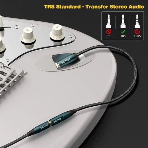 Close-up of a 6.35mm to 3.5mm Headphone Adapter Cable 4 Ft TRS Stereo Male to Female for DJ Mixer Guitar Amp Piano Keyboard Speaker Audio Interface and Studio Setup for Live Performance connected to a guitar.