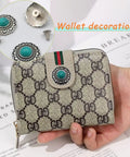 Straight Fire Green Turquoise Concho Buttons 10 Pack With Screw Back Fasteners displayed on a wallet for stylish accents.