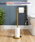 Freestanding Toilet Paper Holder Stand With Reserve For Four Spare Rolls, Sturdy Base, Stainless Steel Construction With Brushed Nickel Finish, No-Fuss Rustproof Bathroom Tissue Roll Storage Shelf in brushed gold finish next to a toilet.