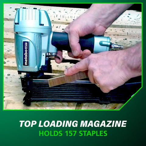 Person loading magazine of Wide Crown Pneumatic Stapler For Sheathing And Insulation, 16 Gauge Nailer with 1 to 2 in staples.