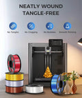 3D printer with Silk PLA Filament 1.75mm Silver 1.1Kg Spool with metal shine and smooth silk finish, assorted filament colors displayed.