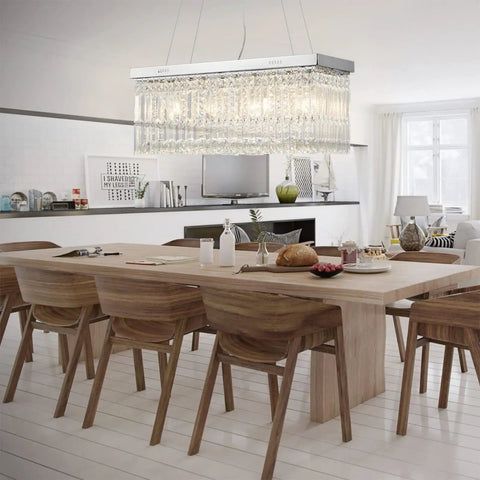 Modern Raindrop K9 Crystal Rectangle Showstopper Chandelier with 11-Light Linear Pendant over dining room table