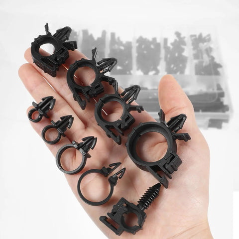 Hand holding various sizes of clips from Dope Car Wire Clip Kit Pack Of 200 Universal Harness Clips And Cable Ties