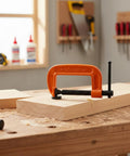 Heavy Duty 1 Inch Iron G Clamp For Woodworking And Furniture Projects With Strong Clamping Power Durable Orange Finish on wood.