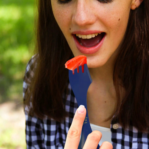 Using the Four Blue Sporks To Go Set With Carrying Case 7 Inch Durable BPA Free 3 In 1 Camping Utensil Kit Spoon Fork And Serrated Knife For Camping Hiking Hunting And Outdoor Adventures to hold a strawberry slice