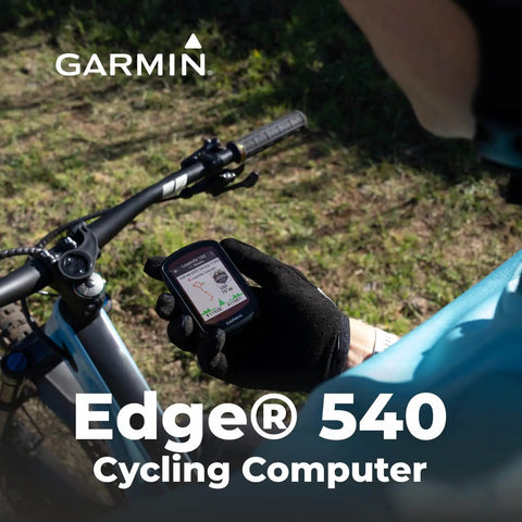 Cyclist using Garmin Edge 540 GPS Cycling Computer With Button Controls, shown mounted on handlebars during outdoor ride