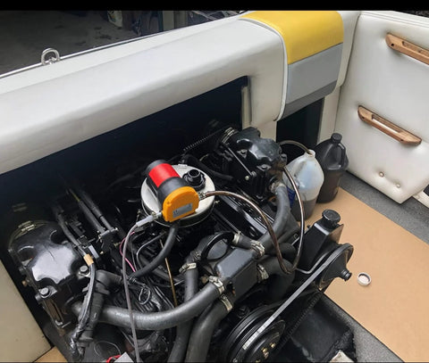 Portable 12V 60W Oil Extractor Pump installed in a boat engine compartment, showing electric oil transfer functionality for fluid changes.