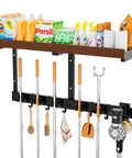 Front view of Space Saving Wall Mount Broom Holder With Cleaning Supplies Organizer, Mop Rack, Vacuum Organizer And Shelf, Broom And Mop Organizer for home storage.
