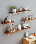 Badass Heavy Duty Metal Shelf Brackets 12 X 8 Inch White L Brackets display with wooden shelves holding jars and plants.