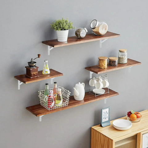Badass Heavy Duty Metal Shelf Brackets 12 X 8 Inch White L Brackets display with wooden shelves holding jars and plants.