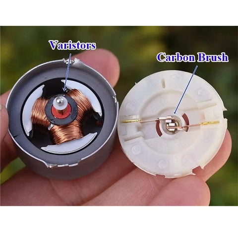 Tiny Powerhouse Mini DC Motor For DIY Projects 32mm Round Spindle With Carbon Brush varistors and components visible