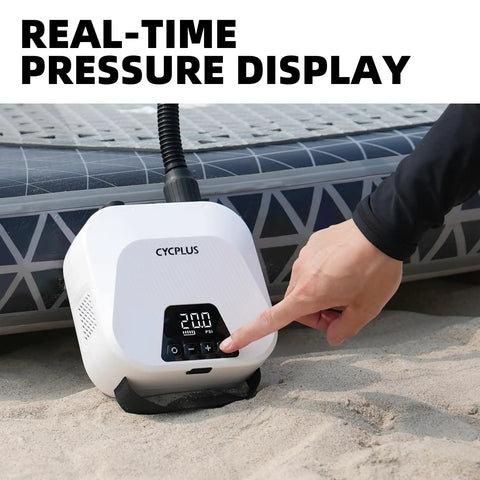 User operating High Pressure Portable Air Pump For Paddle Boards And More Rechargeable Auto Off Dual Stage Inflation And Deflation Quick Fill For SUPs Kites Tents And Mattresses Compact And Easy To Carry