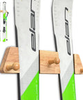 Kickass Oakwood Ski Rack With 3 Hooks Wall Mount Storage For Skis Snowboards Longboards Damage Free Scratch Safe Heavy Duty Garage Home Display Rack For Rider Shred Gear Epic Minimalist Vibe with two skis mounted.