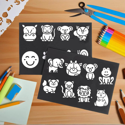 Adhesive Magnetic Sheets 8.5 X 11 Inches, 50 Pack, 30 Mil Flexible Peel And Stick Magnets with animal cutouts on crafting table