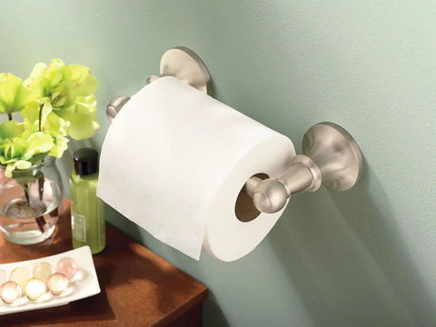 Vale Chrome Double Post Pivoting Toilet Paper Holder Wall Mounted Tissue Dispenser with Easy Roll Change in bathroom.