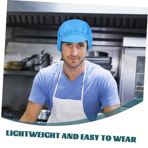 Blue Anti Static Work Caps 5 Pack Breathable Polyester Mesh Hat worn by man in kitchen, lightweight and sweat-resistant.
