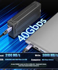 Speed Demon M2 Nvme Ssd Enclosure With Thunderbolt 4 And 5 Compatibility offering 40gbps, connected to a laptop.