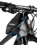 Close-up of waterproof 0.6L bike saddle bag and frame bag on a mountain bike, showing rainproof zippers and durable material.