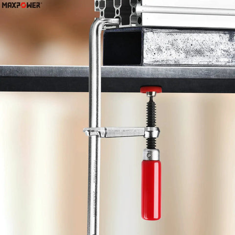 Quick Screw Guide Rail Clamp Set for MFT and Guide Rail Systems shown clamping metal with red handle in use