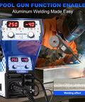 Five In One MIG Welder 250A Multiprocess Workhorse with operator using spool gun for aluminum welding in workshop