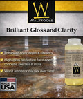 Ultra Tough Polyaspartic Concrete Coating With Bulletproof Abrasion And Chemical Resistance Delivers High Gloss Sealer Protection Zero VOC Formula For Fast Cure And Epic Garage Floors 3 Quart Kit in beige bottle on shiny concrete surface.