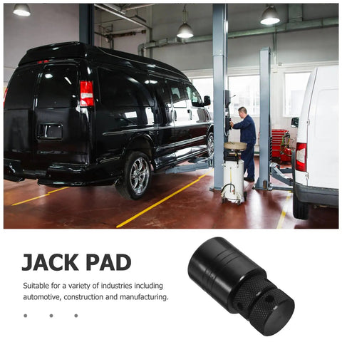 Heavy Duty Spiral Jack Pad With Adjustable Screw Jack Stand 3 Ton Capacity Steel Machinist Block For Vehicle Stabilization And Leveling Built Tough For Safe Lifts next to elevated vehicle in garage