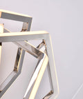 Close-up of Super Clean Chrome Finish And Bright White Panels Super Sleek Led Wall Sconce, modern design with warm 3000k glow.
