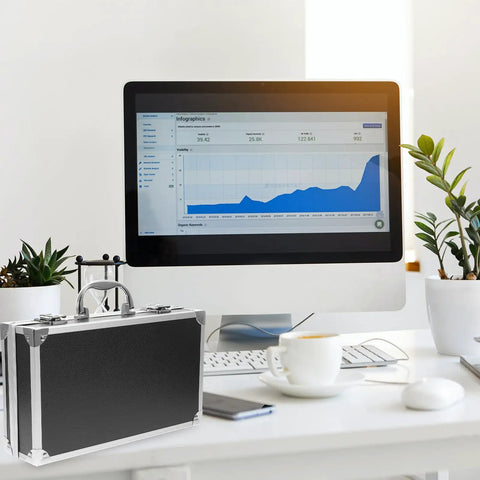 Kickass Aluminum Toolbox Carrying Case With Grip Handle on desk near computer, ideal for office stationery essentials.