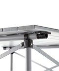 Close-up of Outdoor Folding Table With Aluminum Slat Top And Snap Together Design Seats Four Carry Bag Included Perfect For Camping Tailgating Grilling Hunting Outdoor Dining And More showing corner support and metal slats.