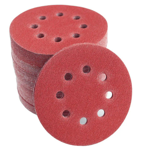 Stack of sanding discs from 210 Piece 5 Inch 8 Hole Sanding Discs Set For Random Orbital Sander Hook And Loop Sandpaper