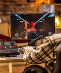 Person using Podcast Setup Bundle For Two Mics TikTok Live Streaming Content Creator Kit with audio interface and mic on desk