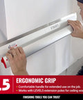 Person using 24-Inch Skimming Blade With 0.3mm German Stainless Steel Insert Replaceable Blade And Ergonomic Aluminum Profile for drywall
