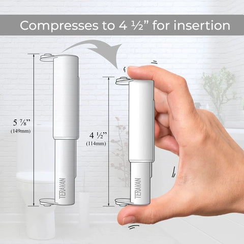 Hand holding Toilet Paper Holder Extender For Extra Large Rolls No Fuss Fit For Double And Triple Rolls In Regular Or Ceramic Wall Mounts Silver Finish Easy Install And Durable Steel Build One Unit, showing compression feature.