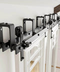 6Ft Double Track Bypass Sliding Barn Door Hardware Kit For Two Doors installed, heavy duty steel, black powder coat, durable rollers
