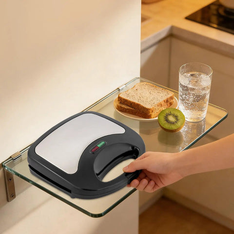 This Sweet 900 Watt Electric Sandwich Maker And Steak Grill Is A Total Game Changer For Your Kitchen Or Office Setup on a shelf.