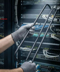 Person installing Solid 0.5U Cabinet Horizontal Lacing Cable Management Bar 2 Pack 18.98 Inch Cold Rolled Steel in server rack.