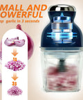 Brigii One Touch Electric Garlic Mincer And Onion Chopper 17oz Mini Food Processor with S shaped blades in action chopping onions.