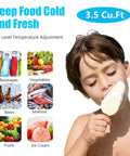 Compact 3.5 Cubic Foot Chest Freezer With Adjustable Thermostat, Super Sleek Mini Deep Freezer For Dorm Room Garage Or Apartment, Keep Your Food Straight Up Frozen With Zero Hassle Ever - Child enjoying ice cream.
