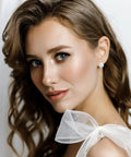 24 Pairs Pearl Stud Earrings Set For Women White And Beige Faux Pearl Studs In Four Sizes 4mm 6mm 8mm 10mm Round Ball Design Ideal For Everyday Wear Gift Idea. White faux pearl stud on model