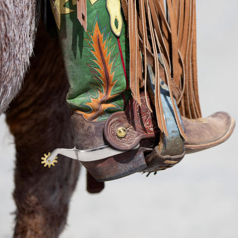 Cowboy boot with Two Pack Horse Spurs Set In Stainless Steel With Gear Copper Rowels on horseback, equestrian trail riding